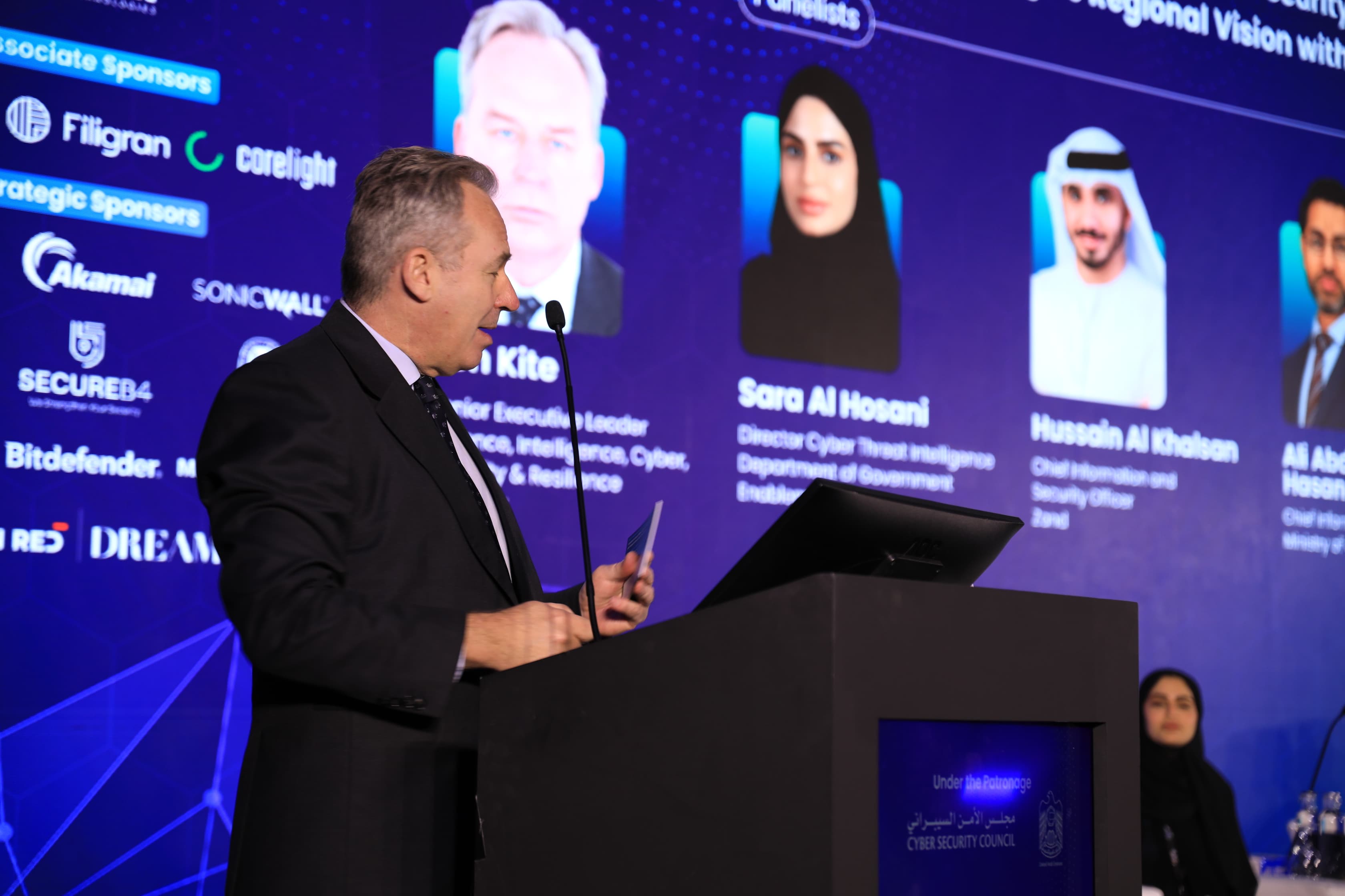 A speaker on stage at Cyber First UAE