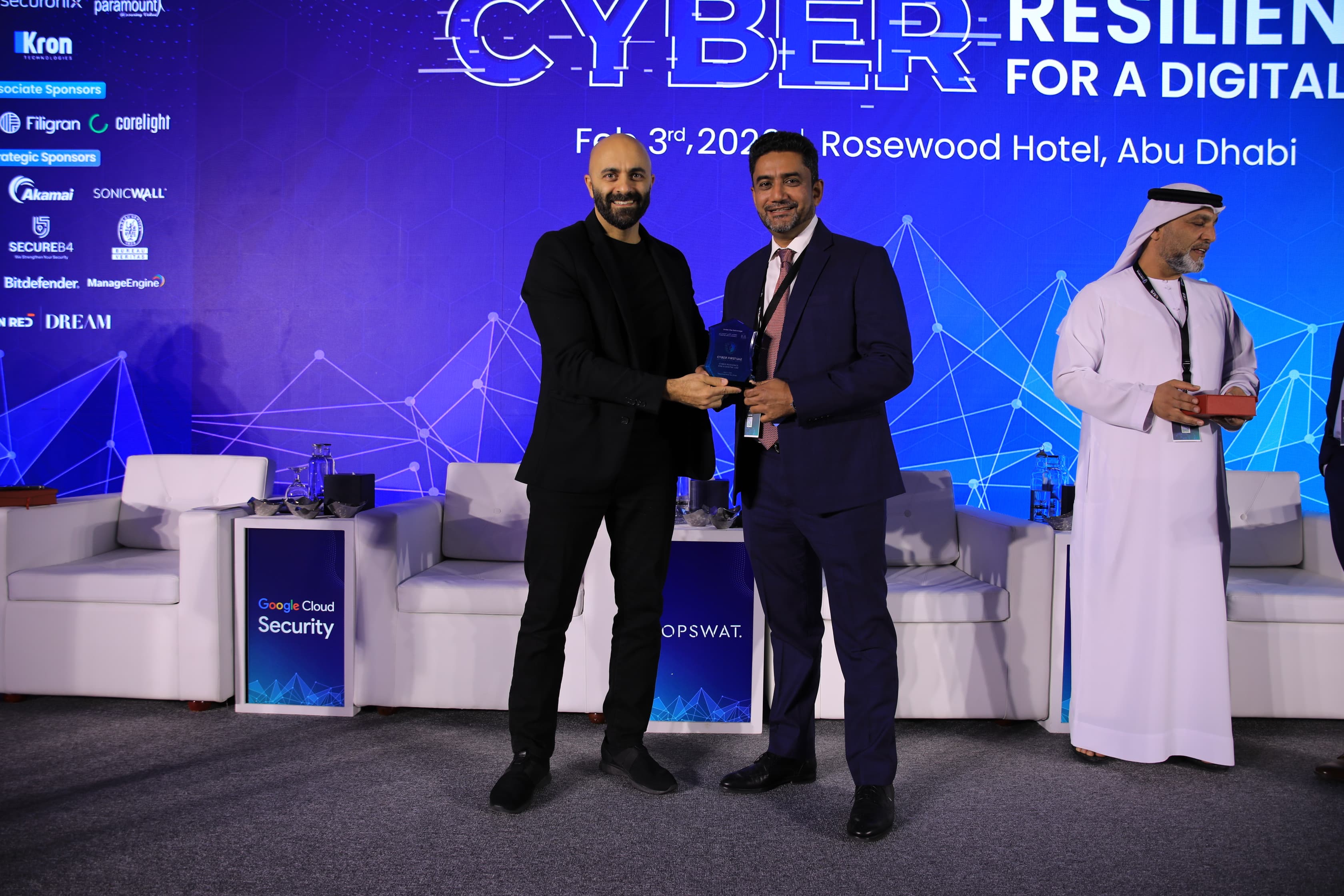 Award presentation on stage at Cyber First UAE