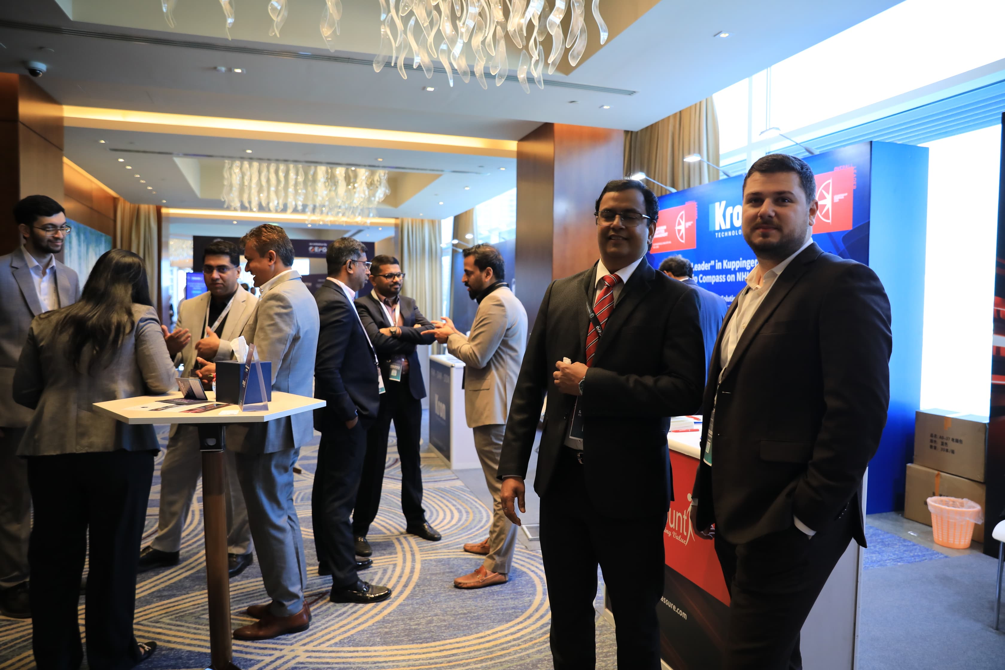 Delegates networking in the exhibition area at Cyber First UAE